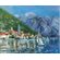 Горы, дома с черепичными крышами, парусная яхта отражаются в глади моря на Адриатическом побережье картины "Черногория"